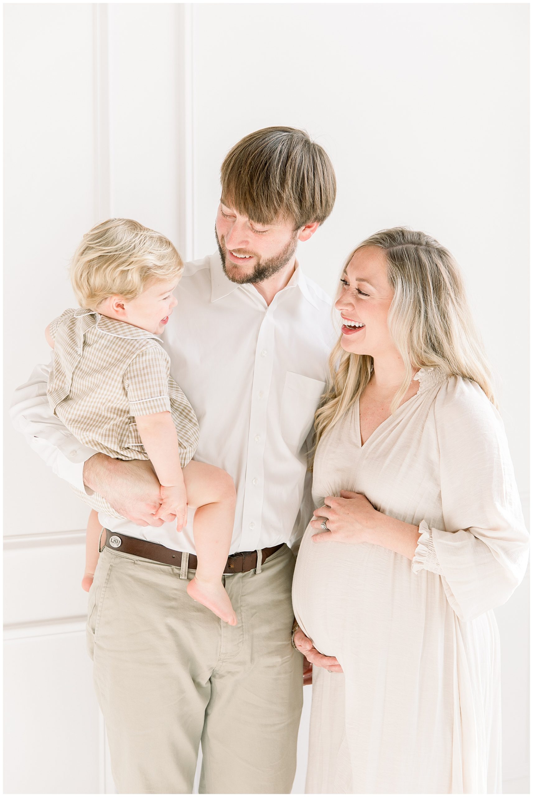 Expecting mama with baby boy and dad taken by Katie Petrick Photography in Charlotte NC
