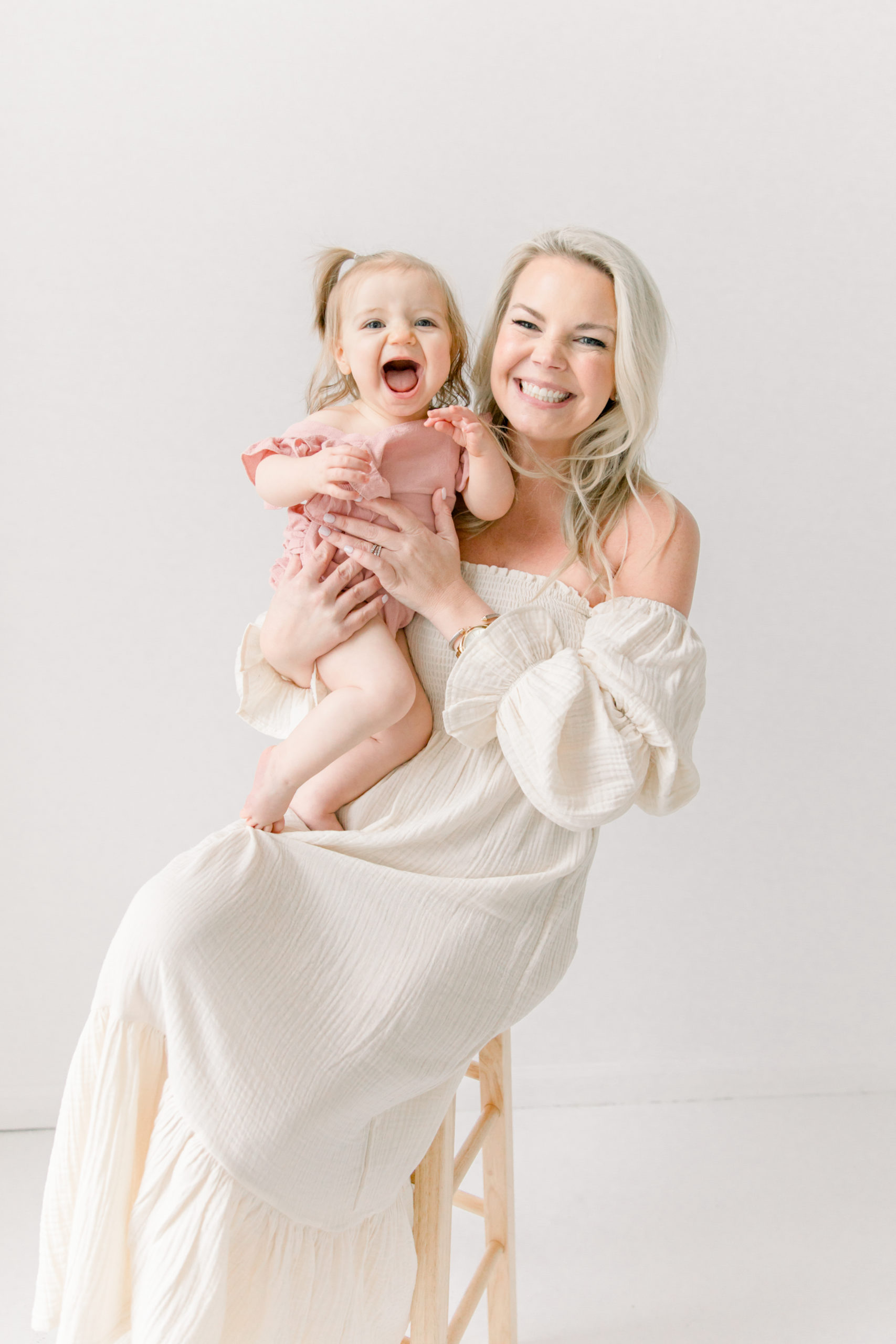 mama and baby girl during studio milestone session by North Carolina family photographer Katie Petrick Photography