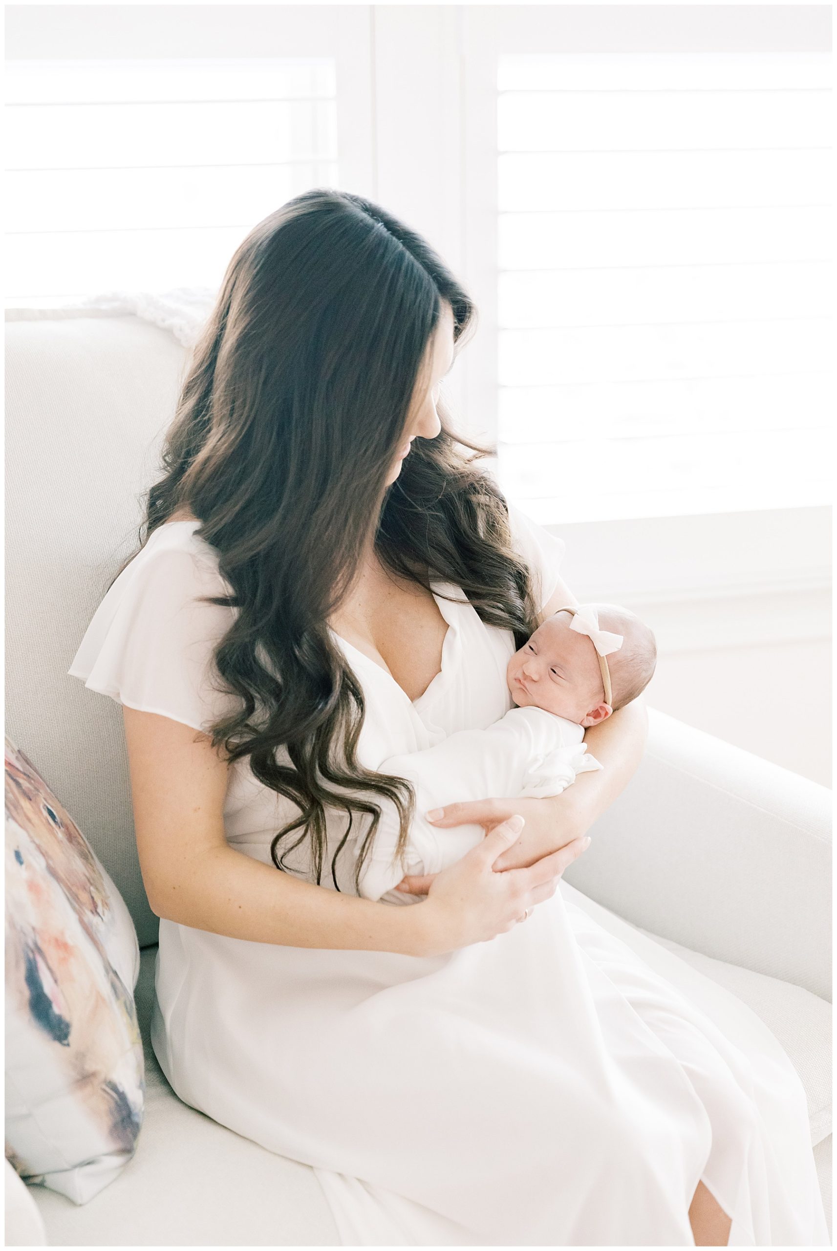 mom holding baby in Charlotte nc - Charlotte lactation consultants