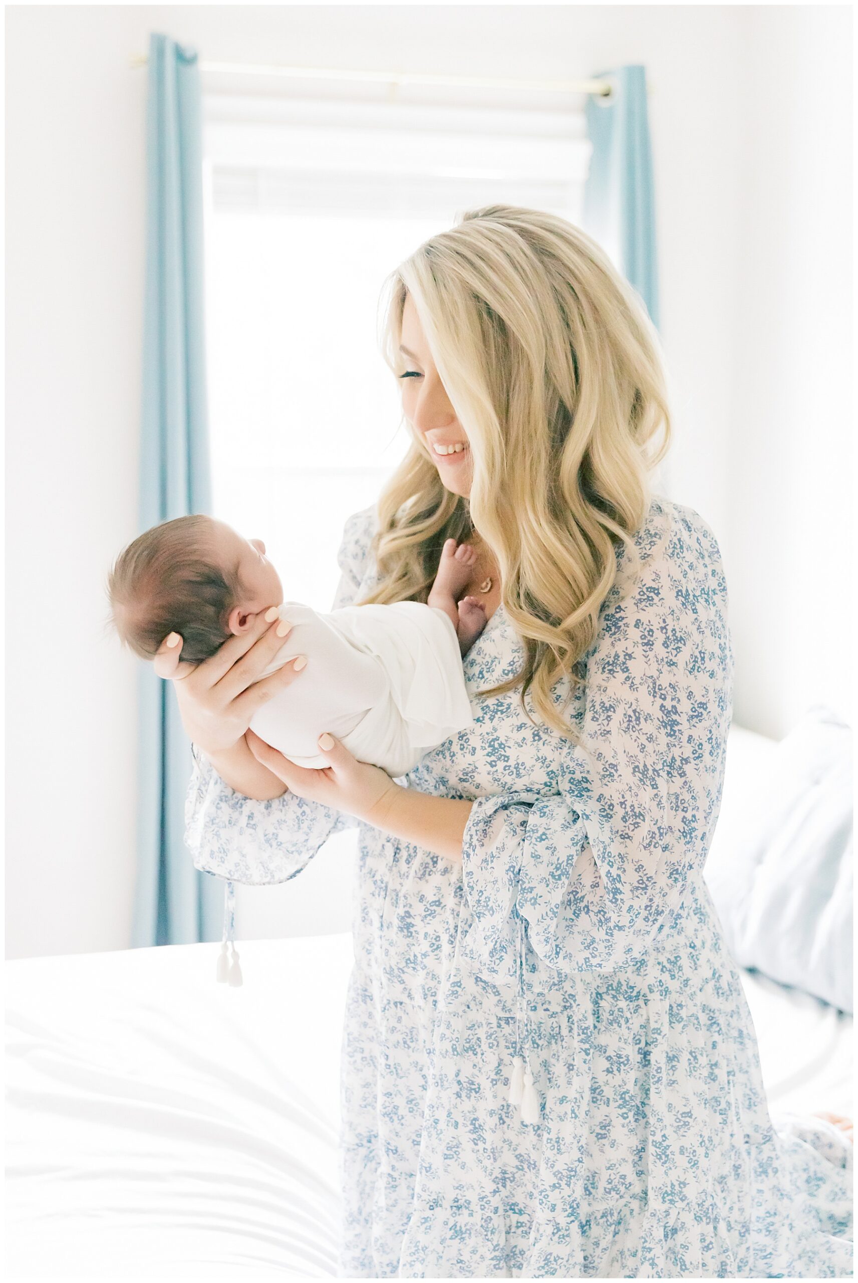 Mama holding baby boy during South Charlotte Newborn session - Katie Petrick Photography