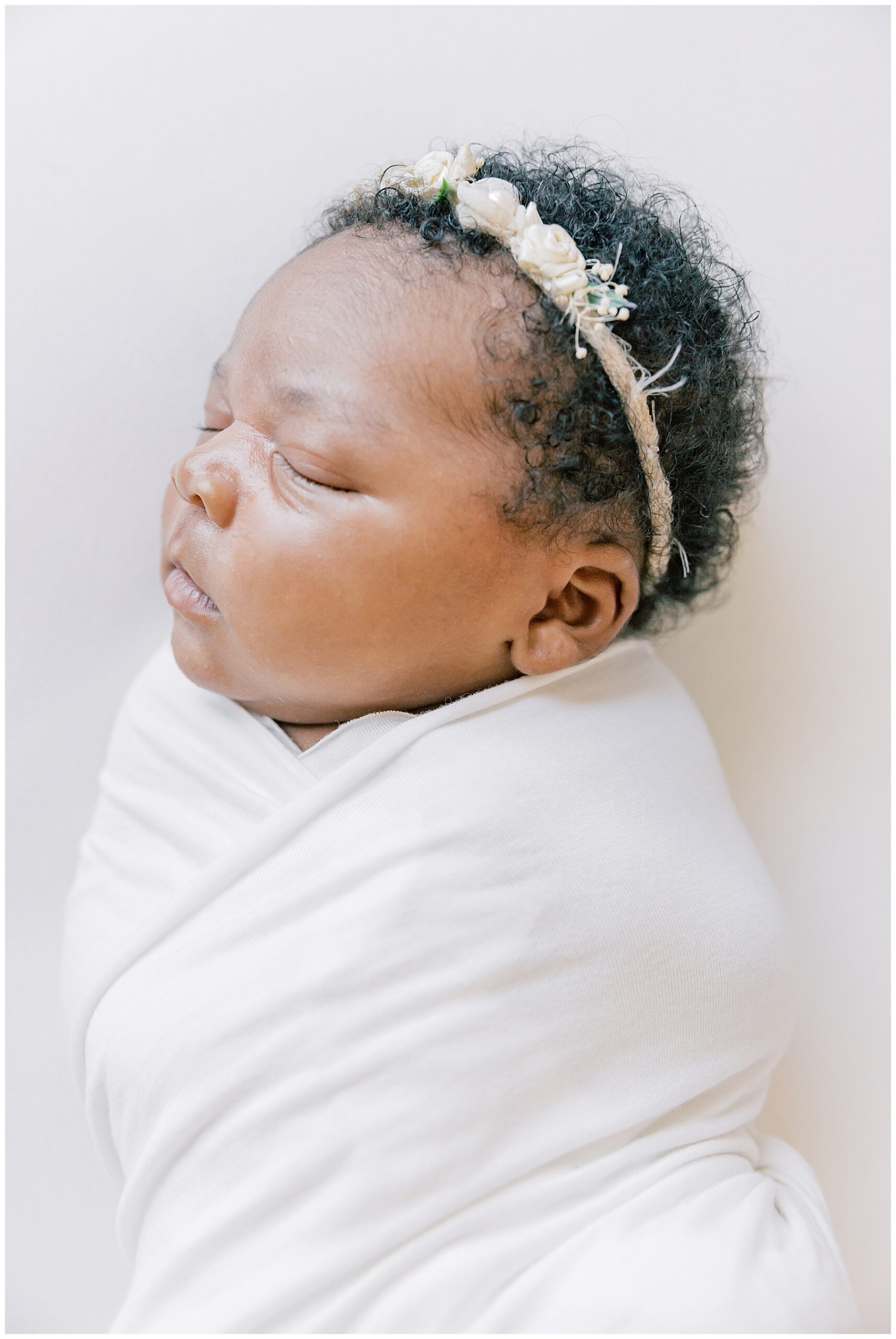 Baby girl during newborn photo session with Katie petrick Photography