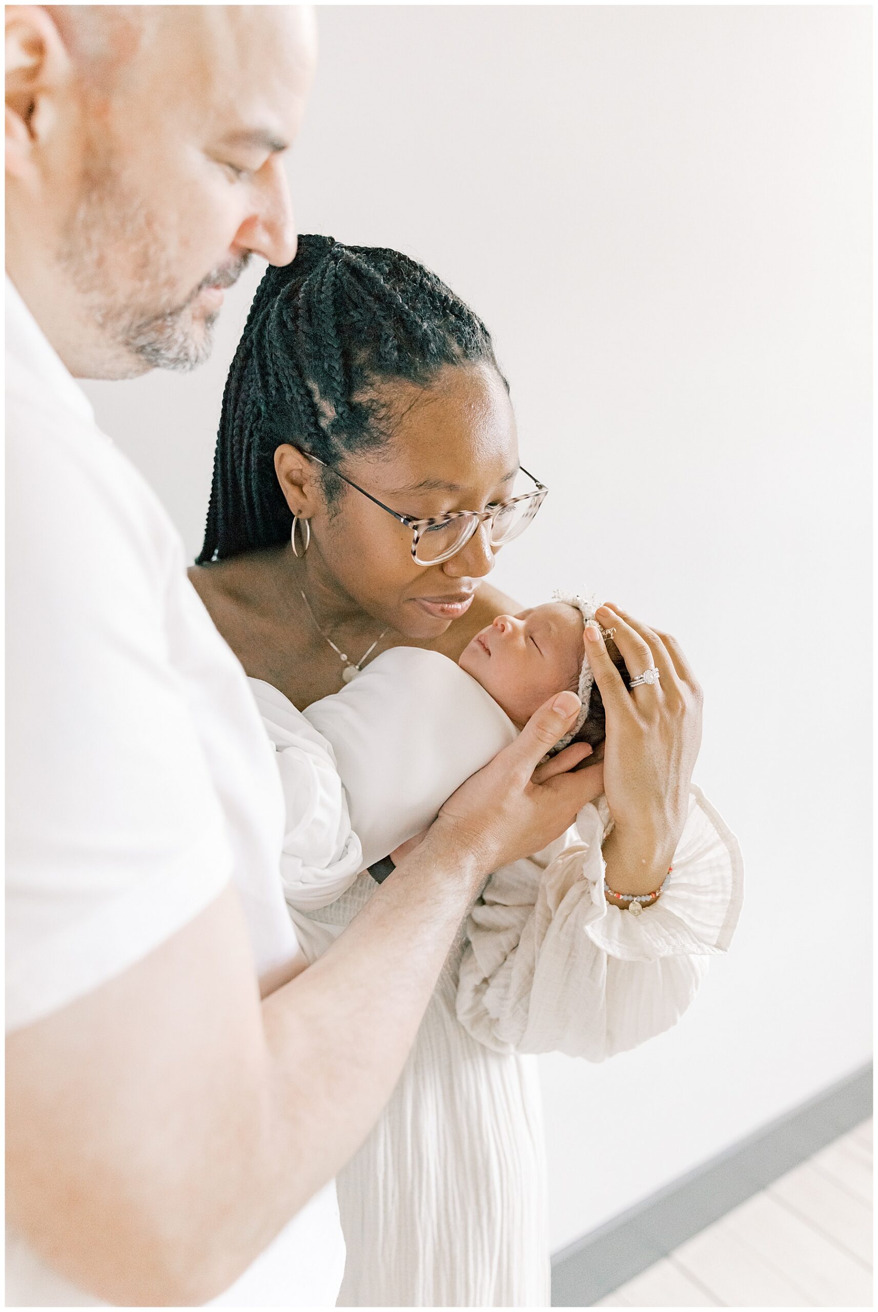 newborn bay photographer in Charlotte NC share sweet moments during sessions