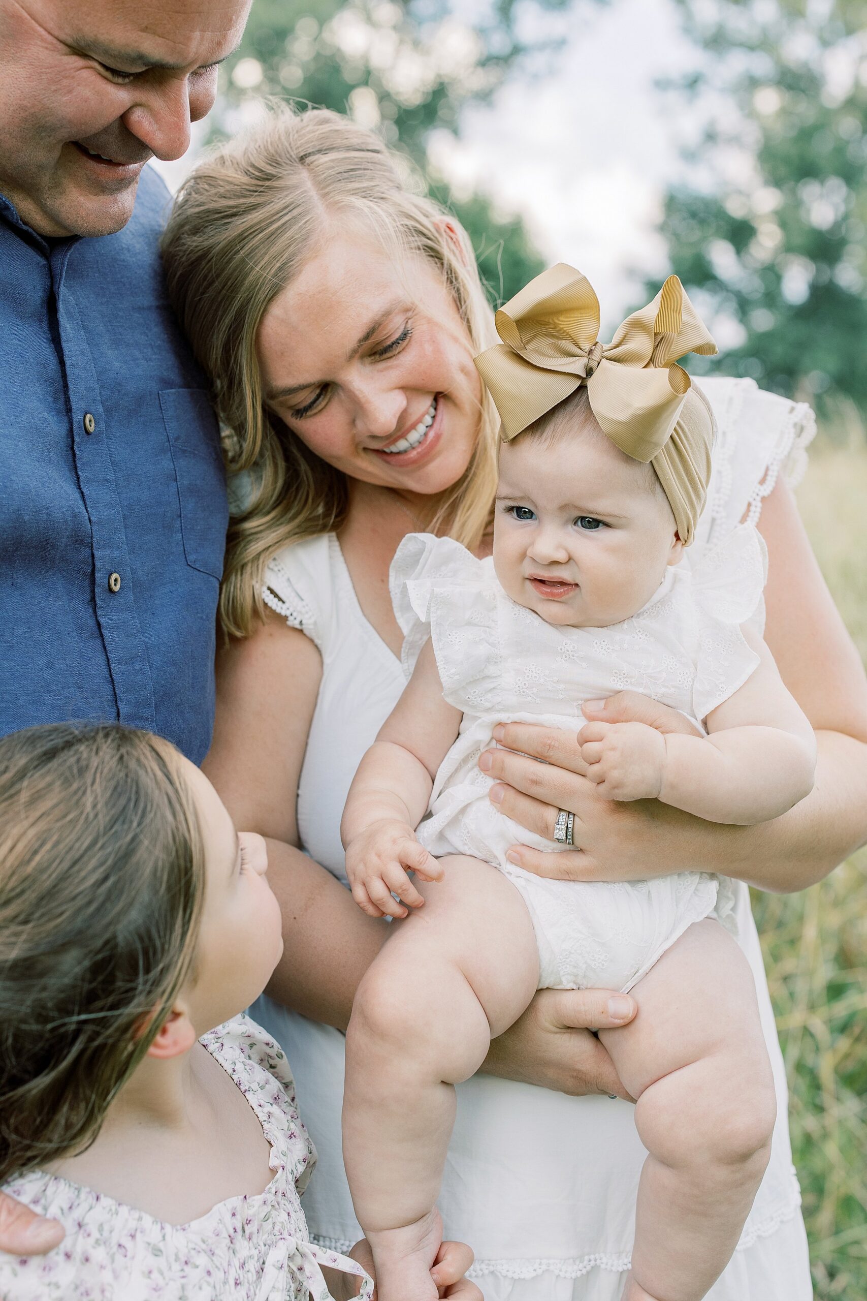 family plays during outdoor family session in Charlotte NC 